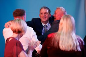 Mark Follos after accepting his award