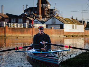 Mike Ellicock in a rowing boat