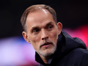 Thomas Tuchel looks on from the dugout