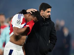 Mikel Arteta consoles his players
