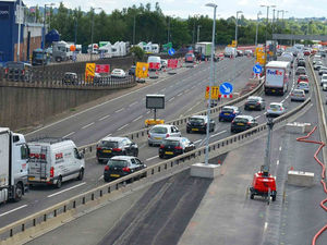 Supporting image for story: Hero lorry driver hauls man from burning car on M5