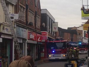 Supporting image for story: Man rescued from flat fire above Clarks shoe shop in Wellington