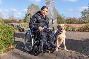 Rajwinder Kaur with support dog Rocky