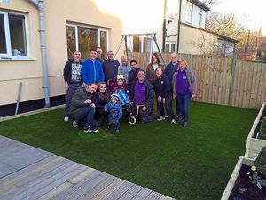 Charlie Gibney with family and the volunteers