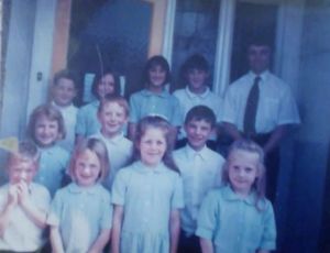 Emmanuel School's original pupils in 1996 with Head Teacher Jonathan Swain