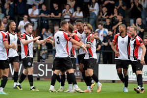 Hednesford Town players celebrate.