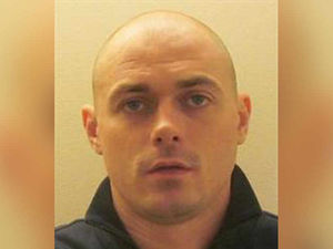 Supporting image for story: £425,000 Telford bank robber on the run from prison