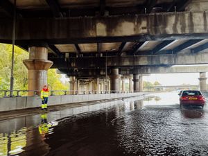 Supporting image for story: Live updates as 22-hour weather warning brings flash floods and closes roads