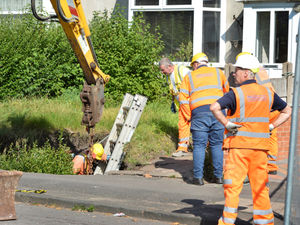 Supporting image for story: Residents evacuated as three-metre deep sinkhole opens up in front garden