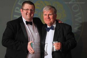 Matt Williams presents stadium announcer Ryan Jervis with his Special Recognition Award for service to Shrewsbury Town.