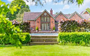 The Dower House in Burwarton features a pool house that opens to a heated swimming pool. Picture: Savills/Rightmove.