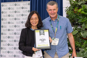 Lian Lin, Lohas Fertiliser, collects her award at Four Oaks (image: HortWeek)