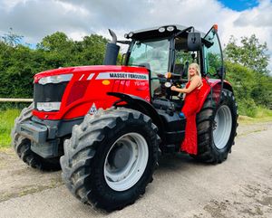 Lottie in her dad's tractor (picture Joanna Williams