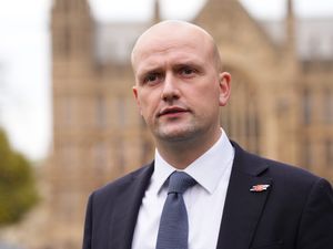 Head and shoulders photo of Stephen Flynn outside Parliament