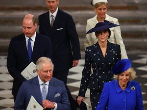 The King and Queen followed by the Prince and Princess of Wales as they process out of Westminster Abbey on Commonwealth Day in 2023