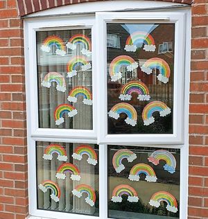 Rainbows painted on the windows at Dimensions