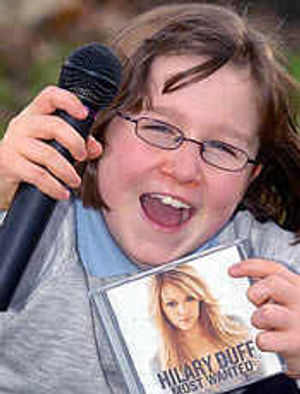 Shropshire youngster Katie Young has taken her first steps on the road to musical stardom after winning a place at the county's "fame academy".