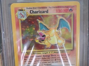 A stolen Pokemon card worth up to £30,000 was returned to its owner (Sussex Police/PA)