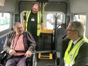 Cllr Louis Stephen chats with passenger 80-year-old David Chatterton and staff driver Lynton Carrier