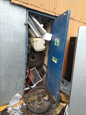 A blocked door marked as a fire escape
