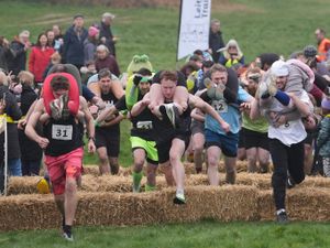Supporting image for story: Will you carry me? Couples dash to be crowned winners of UK Wife Carrying Race