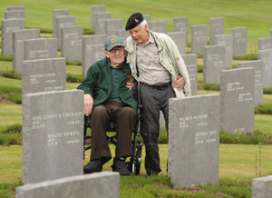 Former war enemies, now friends, (left) Graham Stevenson, aged 93, of Walsall, and Karl Fredrich Koenig, aged 94, of Germany, at Cannock Chase German Military Cemetery..