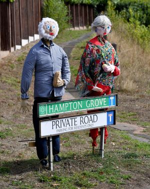 How lovely is this little scarecrow couple on the corner of Hampton Grove?