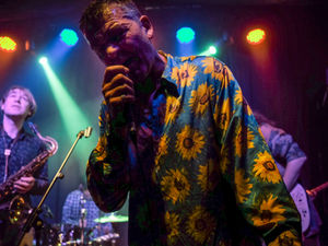 The Courtesy Group performing.