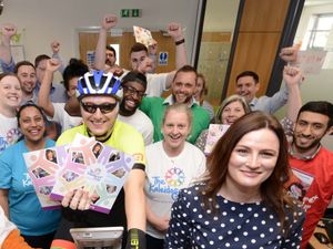 Supporting image for story: Staff in the saddle for charity