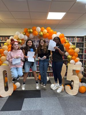 Hart School pupils (L-R) Angel Whyte, Robyn Freeman, Ruby Brittain and Nifemi Ifetayo jump for joy after receiving their GCSE results.