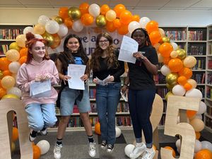 Supporting image for story: Jumping for joy! The Hart School pupils celebrating record-breaking GCSE results