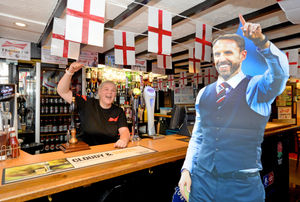 Staff member Vicky Smith looks forward to the games with a cut-out of England manager Gareth Southgate