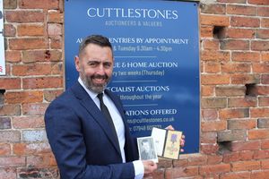 
Cuttlestones’ Ben Gamble with the D.F.C. and a photo of Joe

