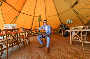 ..Singer/songwriter Dan Marchant entertained the visitors in a Glamping Tipi. one of the options available to stay in the beautiful setting