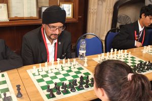 Warinder Juss MP enjoying a game of Chess against a young person