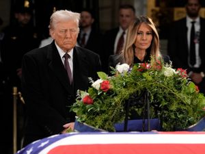 Supporting image for story: Donald Trump joins visitors paying respects to Jimmy Carter