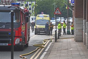 Fire crews respond to the fire in the Beatties building