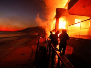 Supporting image for story: Firefighters make progress in slowing Los Angeles wildfires amid devastation