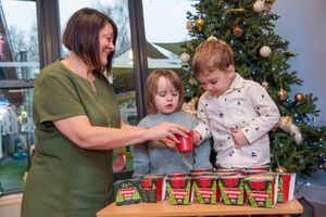 Michelle helping the children get stuck into their new festive project, thanks to Barratt Homes