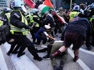 Supporting image for story: Protesters clash with police outside Israeli Consulate in Chicago