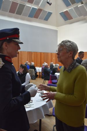 Presenting badge to a volunteer