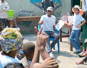 Meeting youngsters in Congo as he plans to build an orphanage