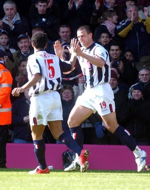 Neil Clement celebrates his goal with Kieran Richardson