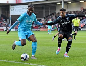 Former Walsall midfielder Romaine Sawyers is back on trial at Bescot.