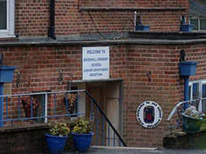 Supporting image for story: Teachers in marking row