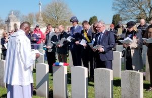 Sir Robert Pound gives a reading during the service