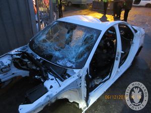 Supporting image for story: Stolen cars found in back street shop