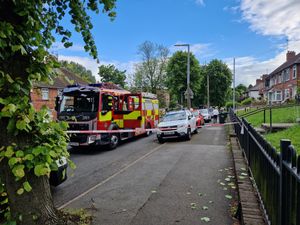 A man and a baby were taken to hospital after the fire