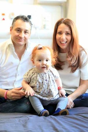 Margot with parents Vikki and Yaser