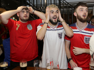 Supporting image for story: Shropshire fans keep the faith as they swing from joy to despair as England slip to World Cup defeat